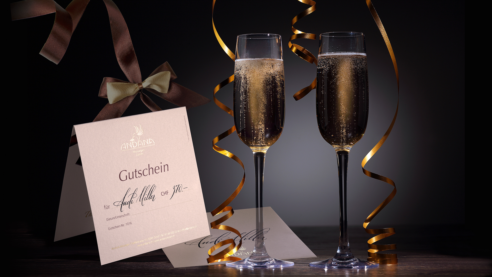 Geschenkgutschein mit zwei Gläsern Champagner 